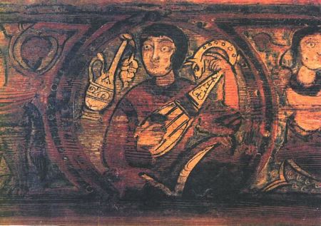 Painted rafters on the ceiling of the Cefalu Cathedral, showing a man playing the lyre