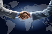 photo of people shaking hands